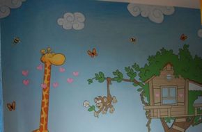 Cameretta fantasia con giraffa e scimmia